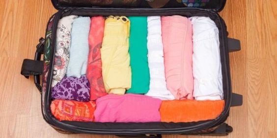 roll the clothes for packing