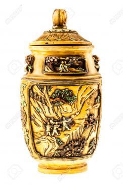a beautiful decorated chinese urn isolated over a white background